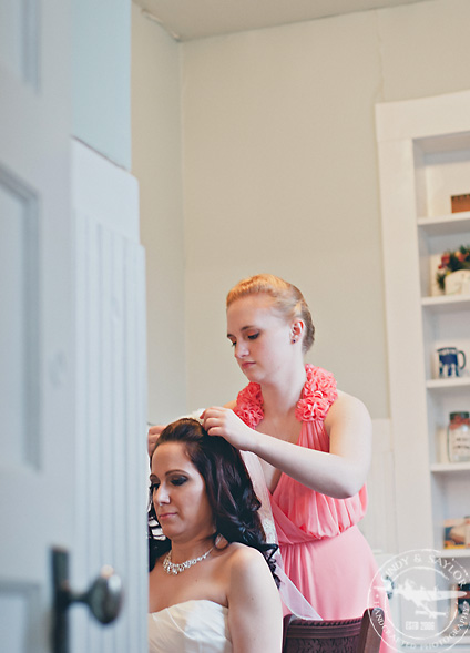 bride getting ready in a vintage farmhouse the delaney house at chestnut square in mckinney