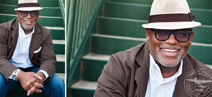 man with straw hat sitting on green steps in downtown mckinney