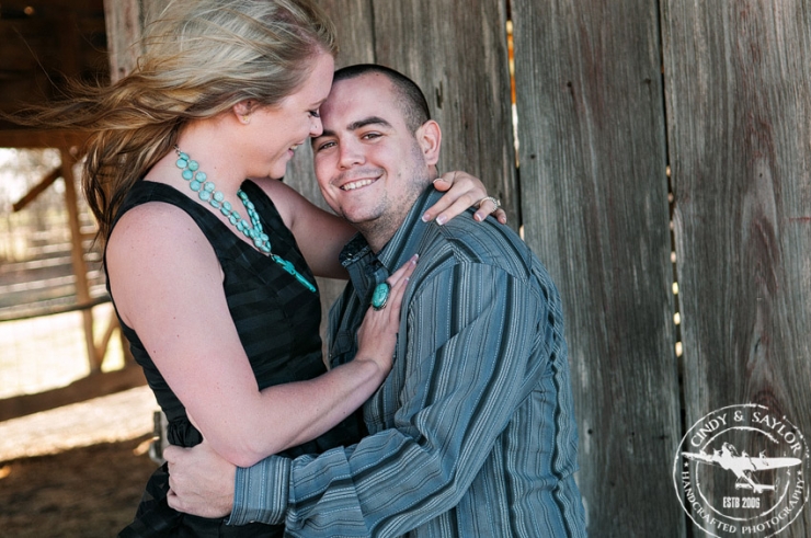 rustic engagement session in a hay barn photography by Cindy & Saylor Photographer