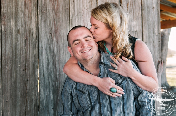 rustic engagement session in a hay barn photography by Cindy & Saylor Photographer