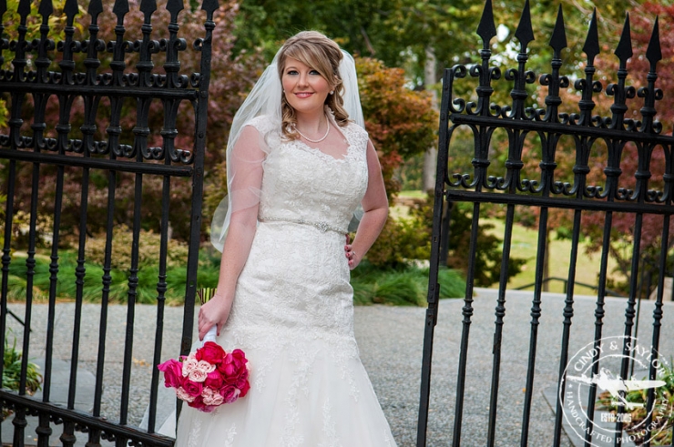 bride with garden gates in dallas at the arboretum